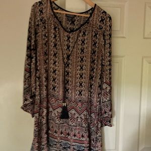 Pretty , lightweight, loose, fit, midi can be worn with sandals or jeans boots